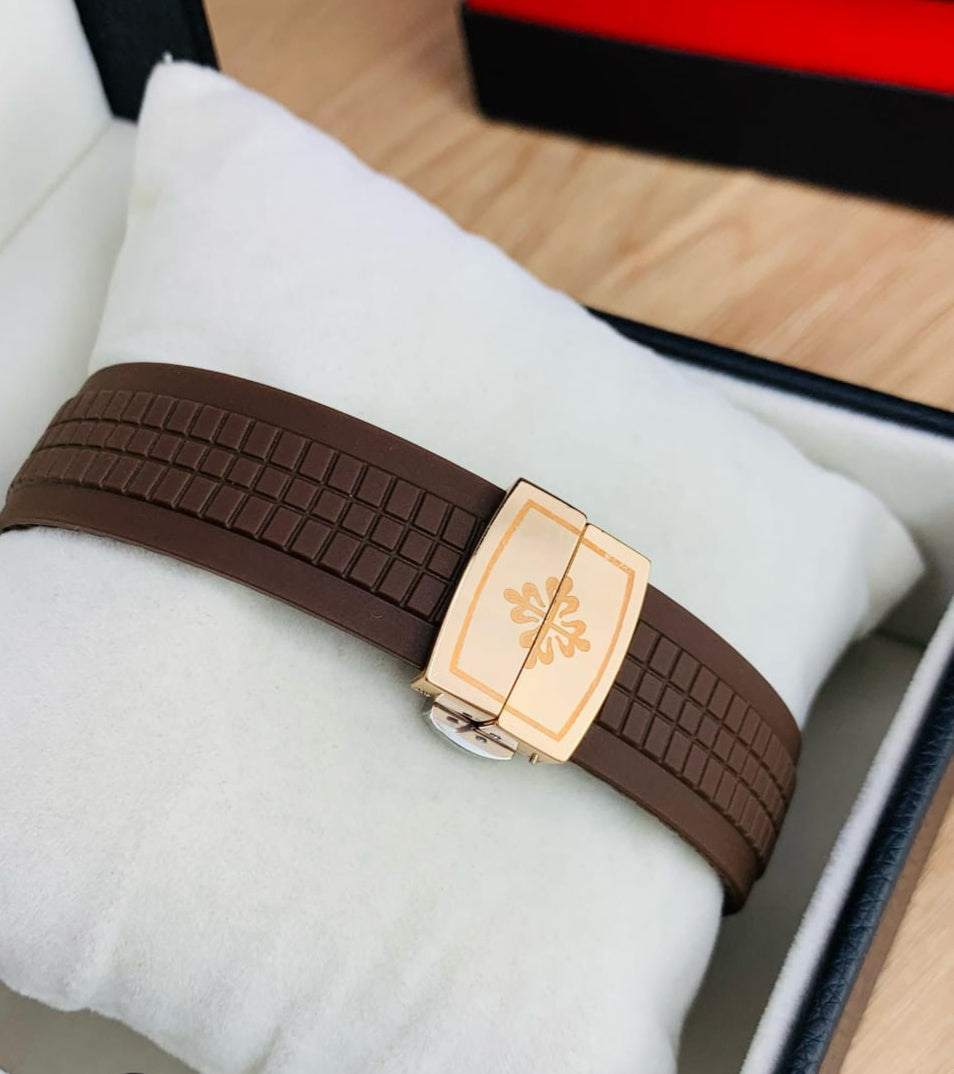 Patek Philippe Nautilus Golden Bazel – Rubber Strap, Butterfly Lock, Date & Time