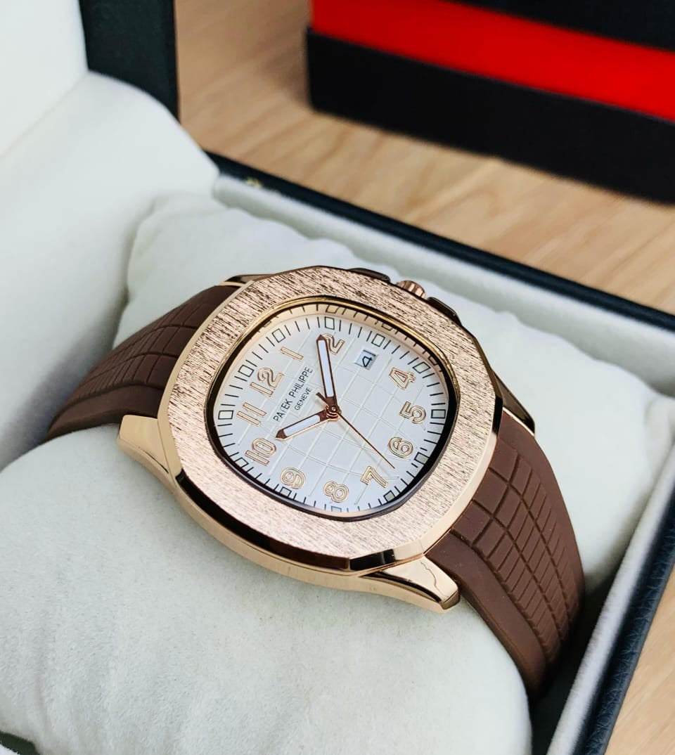 Patek Philippe Nautilus Golden Bazel – Rubber Strap, Butterfly Lock, Date & Time